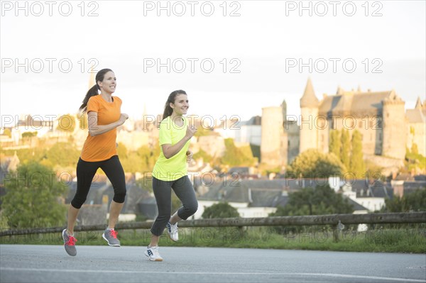 Caucasian women jogging outdoors