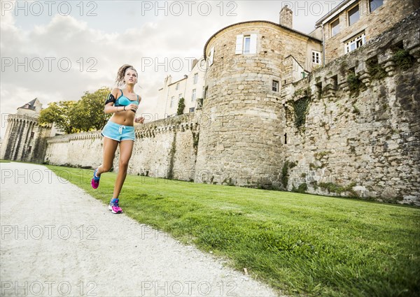 Caucasian woman jogging outdoors