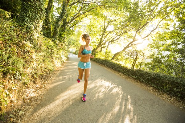 Caucasian woman jogging outdoors