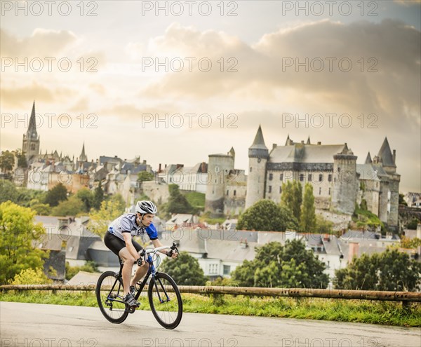 Caucasian man cycling outdoors