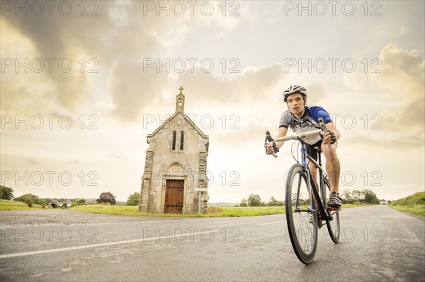 Caucasian man cycling outdoors