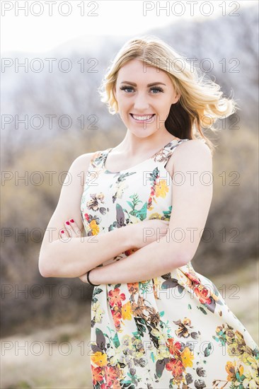 Caucasian teenage girl standing outdoors