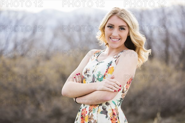 Caucasian teenage girl standing outdoors