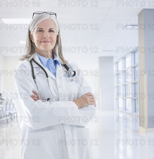 Portrait of smiling Caucasian doctor