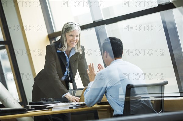 Business people talking in meeting