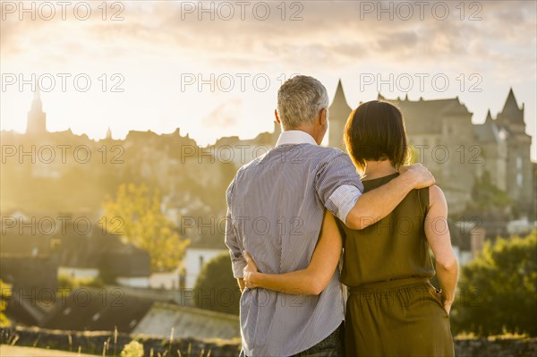 Caucasian couple admiring scenic view