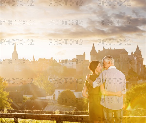 Caucasian couple enjoying scenic view