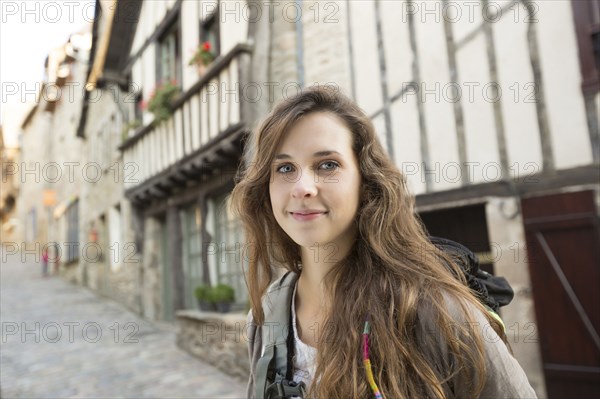 Caucasian woman posing in city