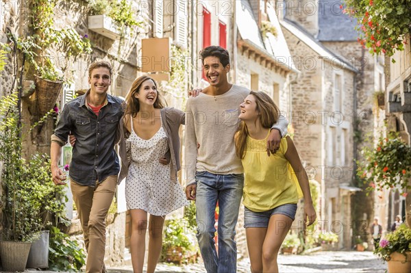 Friends walking in city