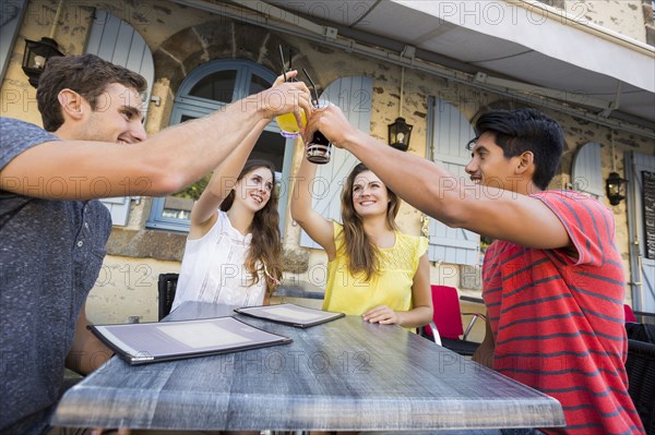 Friends toasting at restaurant