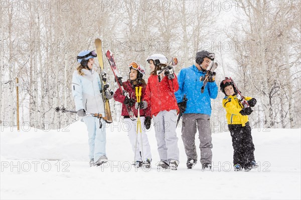 Smiling Caucasian family on skiing vacation