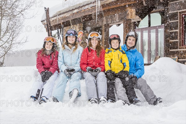 Portrait of smiling Caucasian family on winter vacation