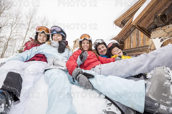 Portrait of smiling Caucasian family on winter vacation