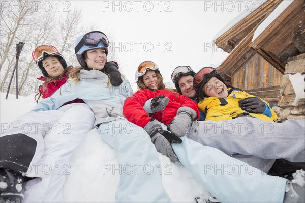 Portrait of smiling Caucasian family on winter vacation