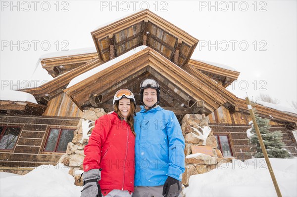 Portrait of smiling Caucasian couple on winter vacation