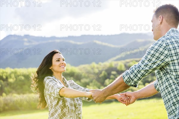 Couple dancing in park