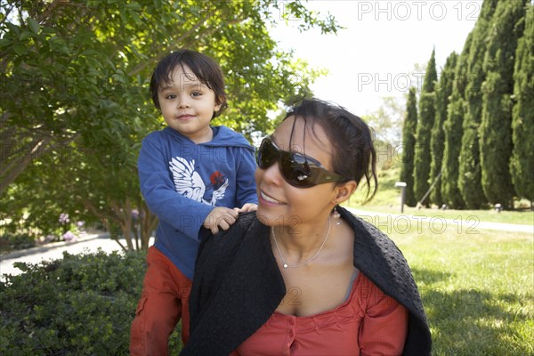 Mother and son enjoying park