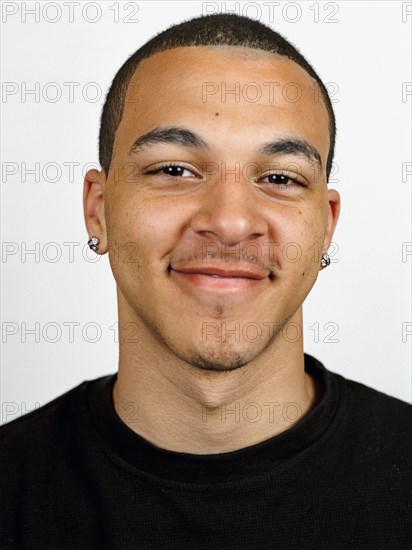 Mixed race man smiling