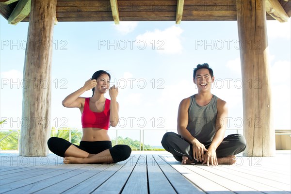 Couple practicing yoga together