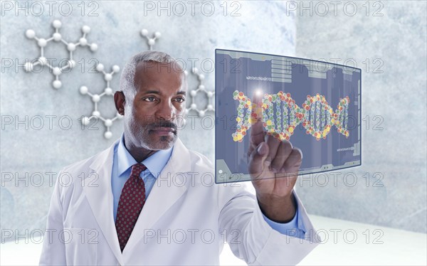 Black doctor using digital display