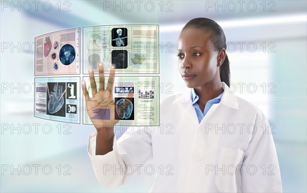 African American doctor using digital display
