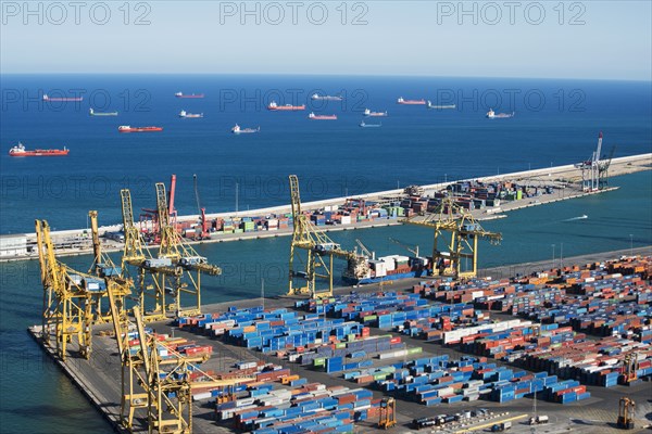 Cargo containers and ships at port