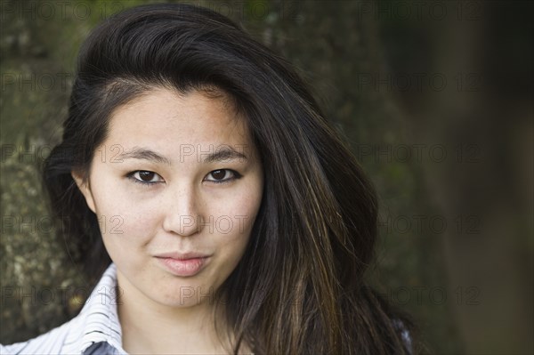 Close up of smiling Japanese woman