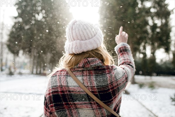 Rear view of Caucasian woman outdoors in snow