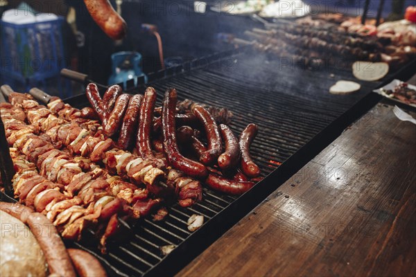 Meat cooking on grille