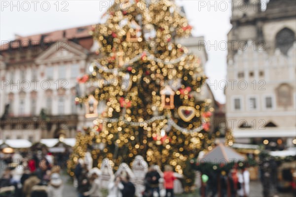 Crowd near Christmas tree outdoors