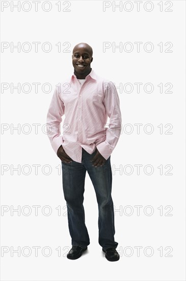 Portrait of African man with thumbs in pockets
