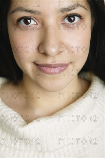 Close up of Hispanic woman smiling