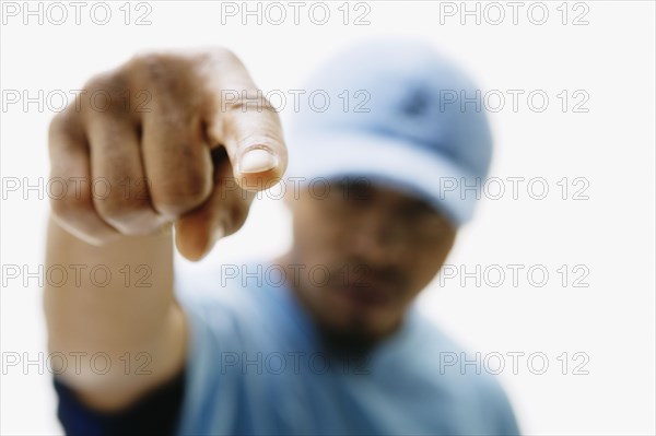 Close up of African man pointing