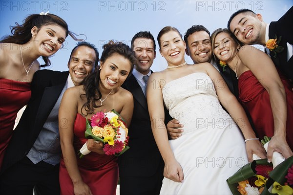 Low angle view of multi-ethnic bridal party