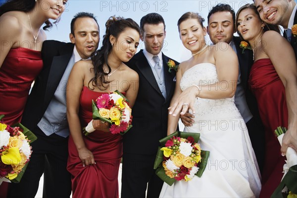 Low angle view of multi-ethnic bridal party