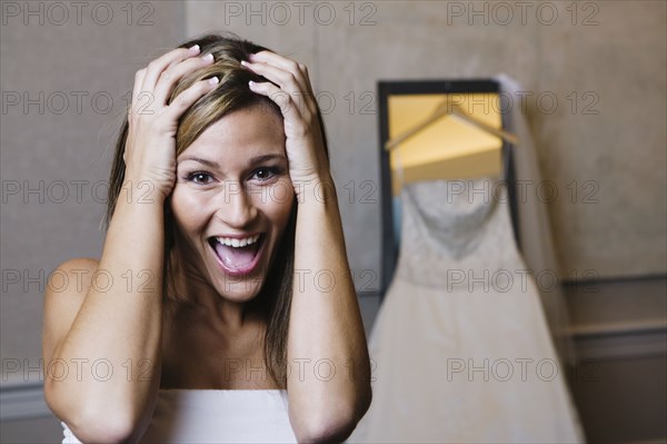 Bride yelling with hands on head