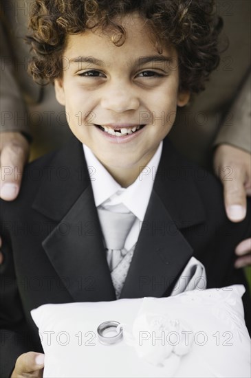 Boy as ring bearer at wedding