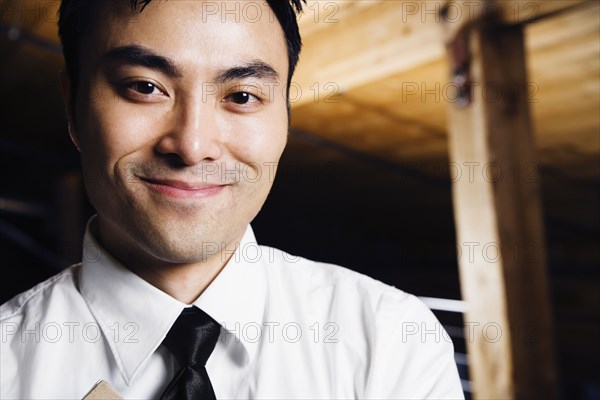 Close up of Asian man smiling