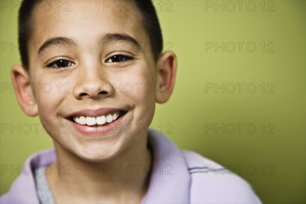 Close up of Asian boy smiling