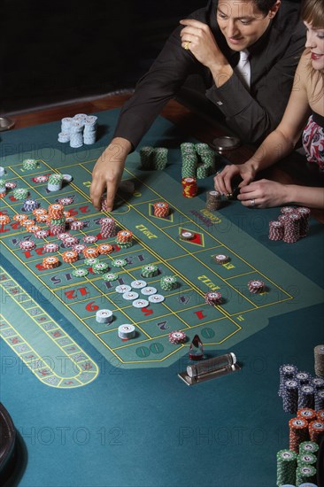 Couple gambling in a casino