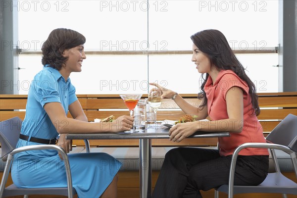 Two women eating at restaurant