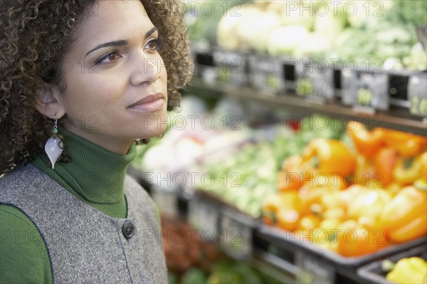 African woman in grocery store