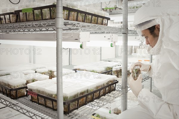 Middle Eastern scientist in clean suit in laboratory