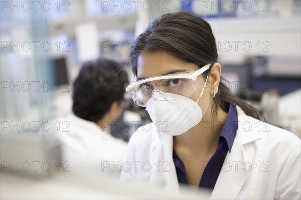 Indian scientist working in laboratory