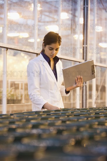 Indian scientist working in laboratory