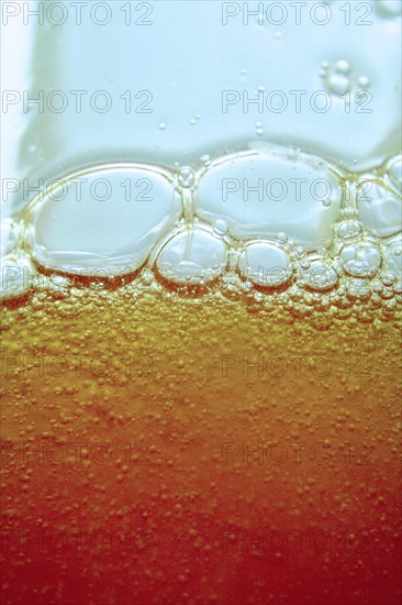 Close up of bubbles in beer glass