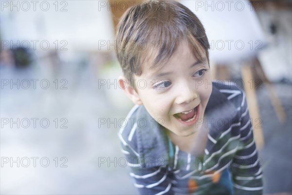 Curious Hispanic boy