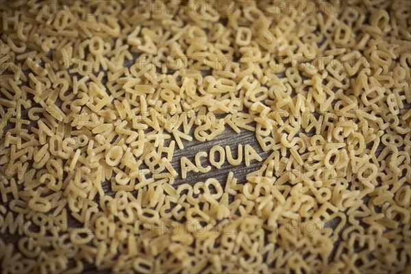 Alphabet noodles spelling acqua