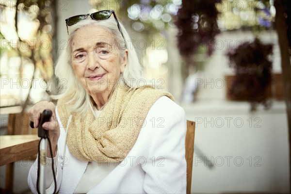 Portrait of smiling older Caucasian woman wearing scarf