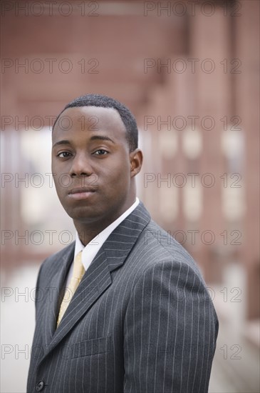 Close up of African businessman looking serious